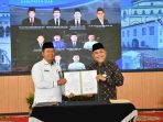 BRK_Syariah_dan_BWI_Kabupaten_Siak_Tandatangani_Nota_Kesepahaman,_dalam_Rangkaian_Launching_Program_Kota_Wakaf_1 (1)_11zon
