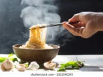 hand-uses-chopsticks-pickup-tasty-260nw-1032590293