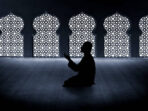 Silhouette of muslim man praying