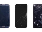 Three phones with broken screens. isolated on white background